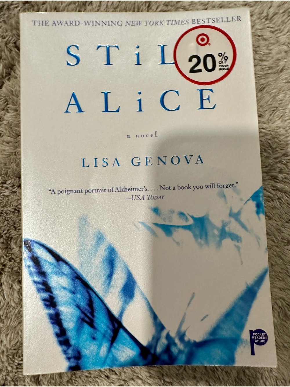 Still Alice by Lisa Genova - White & Blue Paperback Novel
